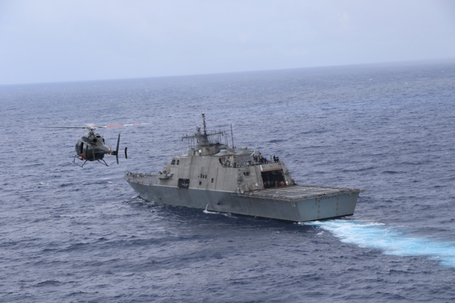USS Wichita (LCS 13) and Jamaica Defence Force Coast Guard patrol vessel HMJS Cornwall sail in formation during a live-fire exercise.