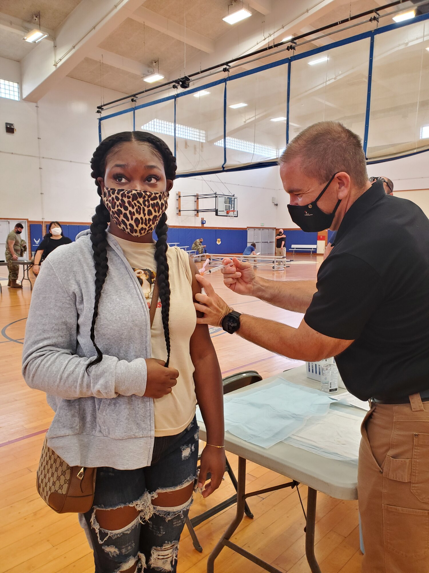 The Johnson & Johnson COVID-19 vaccine is administered to a Team Kadena member.