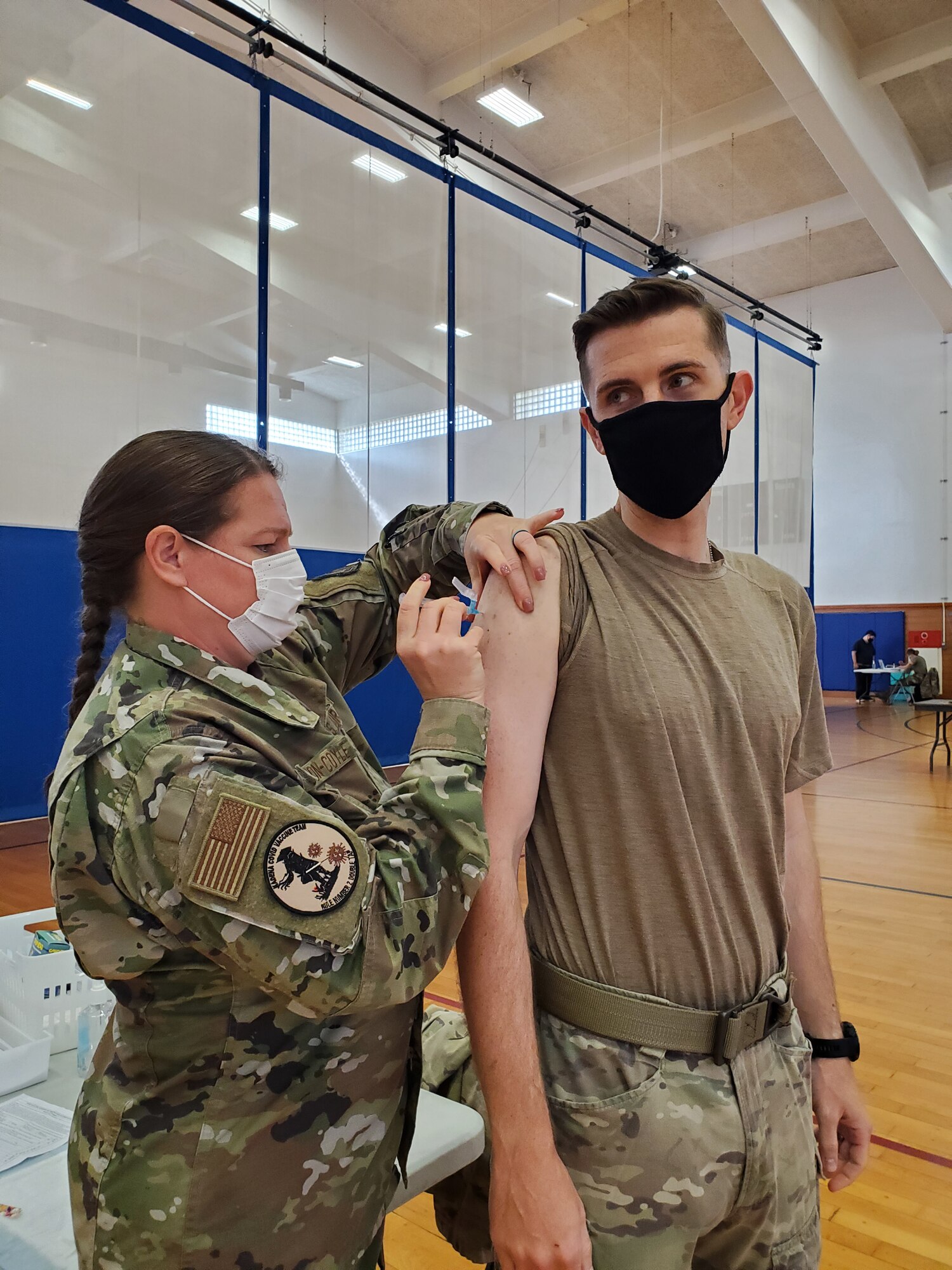 The Johnson & Johnson COVID-19 vaccine is administered to a Team Kadena member.