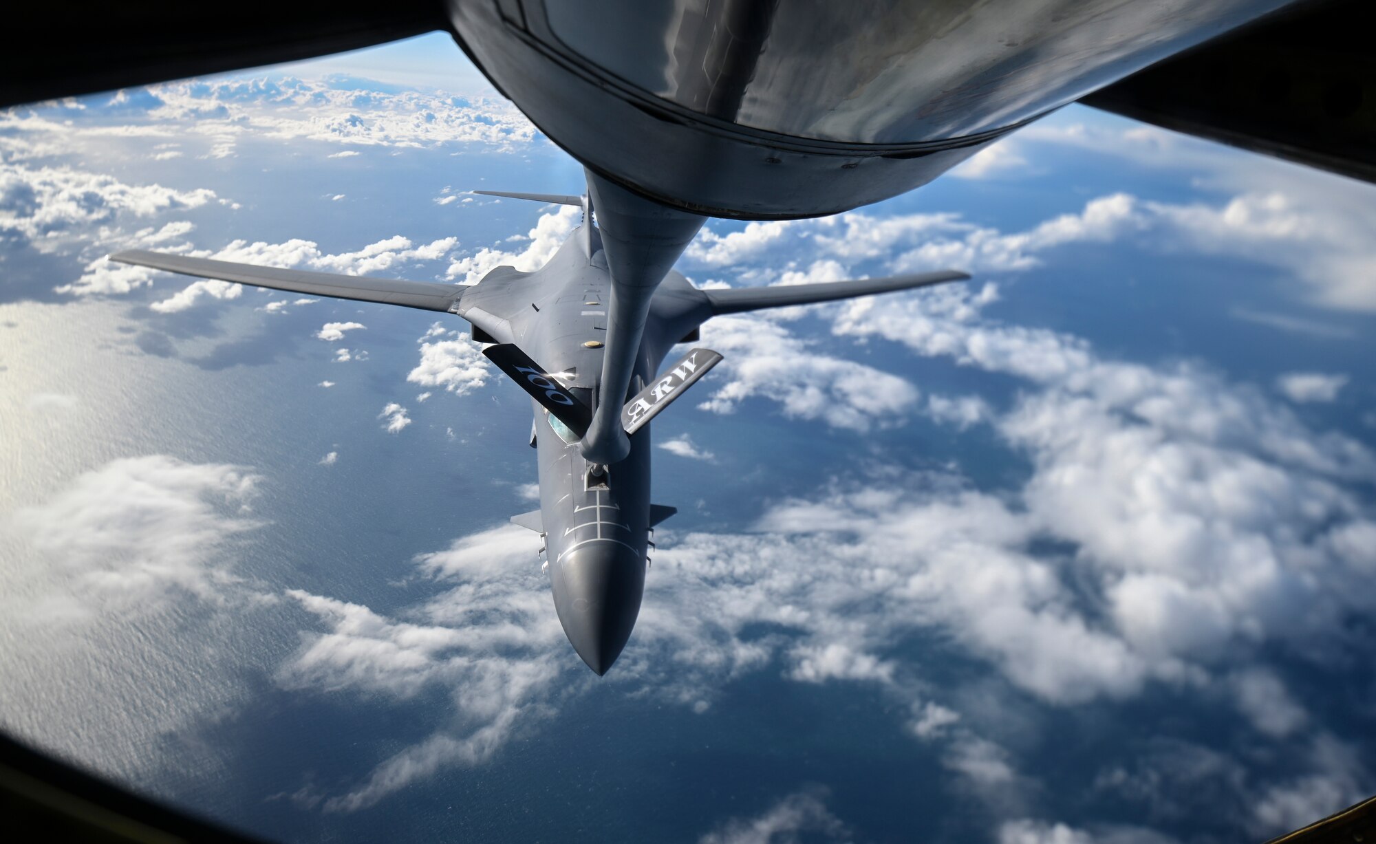 A U.S. Air Force B-1B Lancer aircraft assigned to the 7th Bomb Wing receives fuel from a KC-135 Stratotanker aircraft assigned to the 100th Air Refueling Wing during a Bomber Task Force mission off the Scottish Coast, April 12, 2021. Strategic bomber missions familiarize aircrew with air bases and operations in different geographic combatant commands’ areas of operation. (U.S. Air Force photo by Tech. Sgt. Emerson Nuñez)