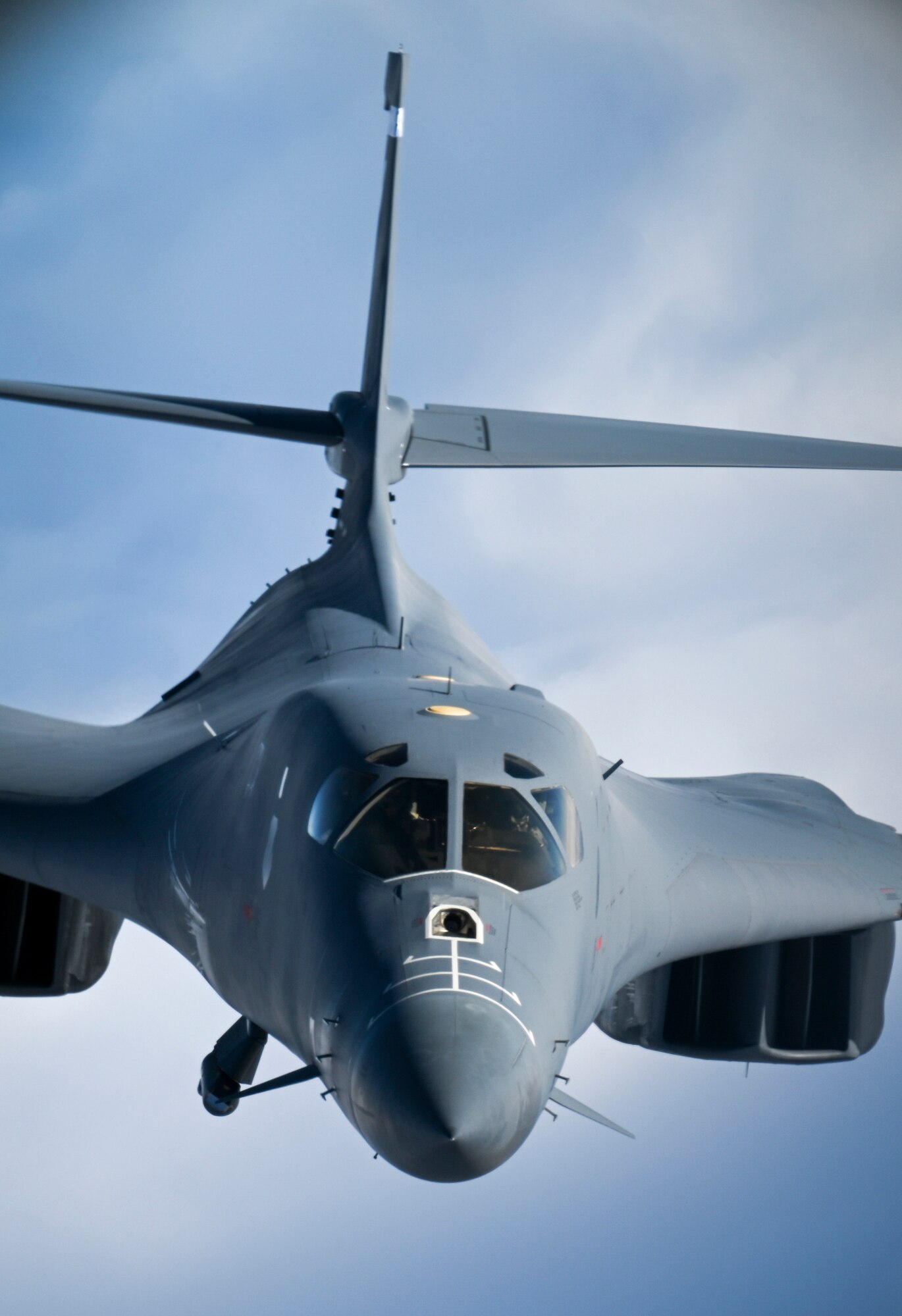 A U.S. Air Force B-1B Lancer aircraft assigned to the 7th Bomb Wing approaches a KC-135 Stratotanker aircraft assigned to the 100th Air Refueling Wing to receive fuel during a Bomber Task Force mission off the Scottish Coast, April 12, 2021. Strategic bomber missions familiarize aircrew with air bases and operations in different geographic combatant commands’ areas of operation. (U.S. Air Force photo by Tech. Sgt. Emerson Nuñez)