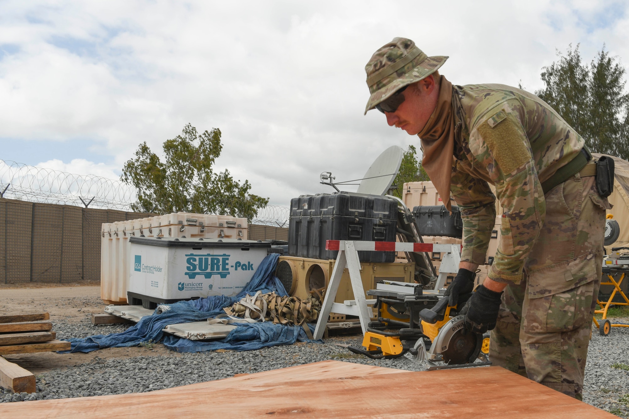 U.S. Air Force Staff Sgt. Garison Dollar, 786th Civil Engineer Squadron structural specialist, prepares to cut a wall cutout March 23, 2021, at Camp Simba, Kenya. The 786th CES deployed to Camp Simba to help expand the base, as well as to provide the base with improvements to quality of life.