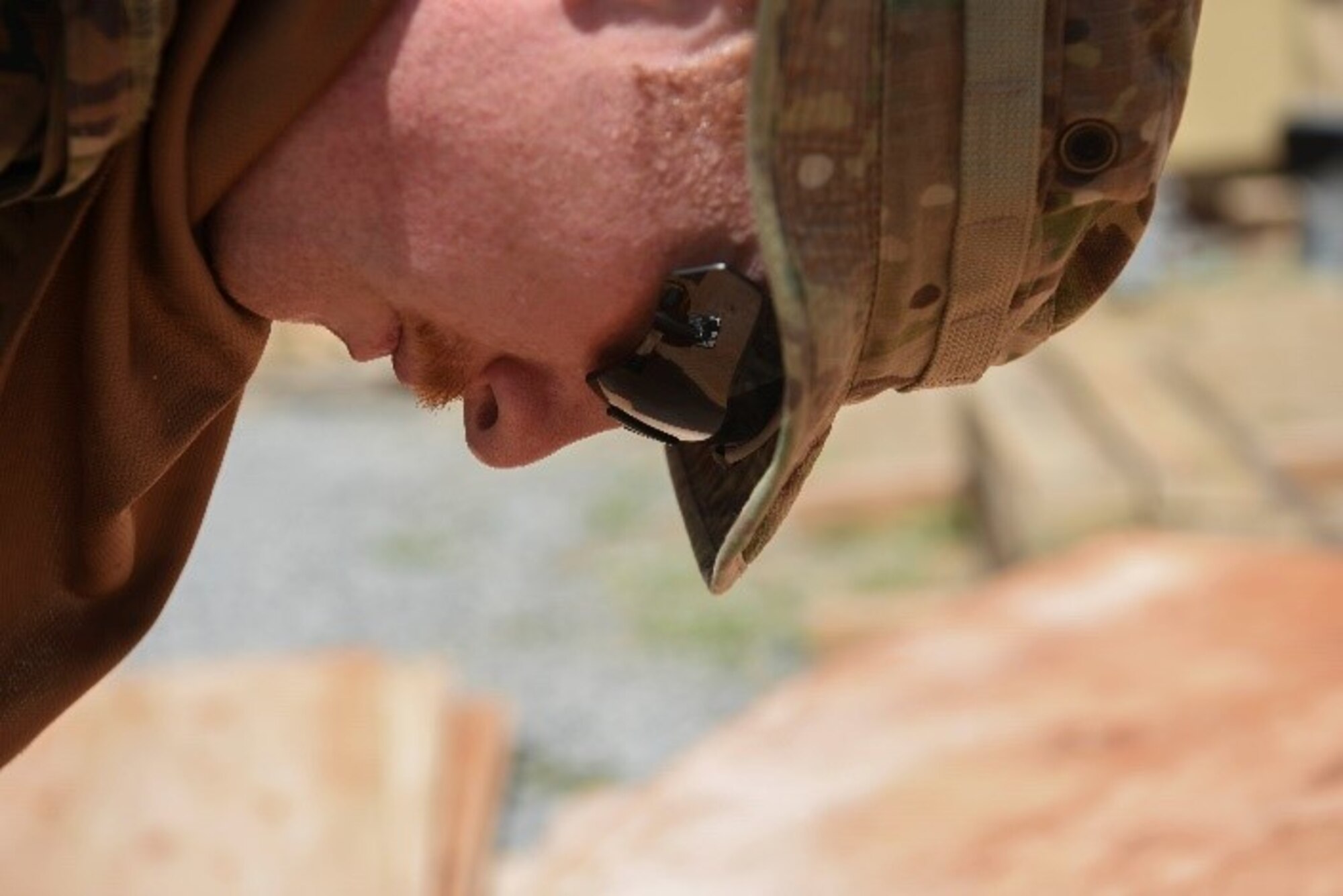 U.S. Air Force Staff Sgt. Garison Dollar, 786th Civil Engineer Squadron structural specialist, cuts a wall template for a tent March 23, 2021, at Camp Simba, Kenya. The 786th CES provided Camp Simba with building new structures, water systems and maintenance so the base can provide continued vigilance to the Combined Joint Task Force-Horn of Africa area of responsibility.