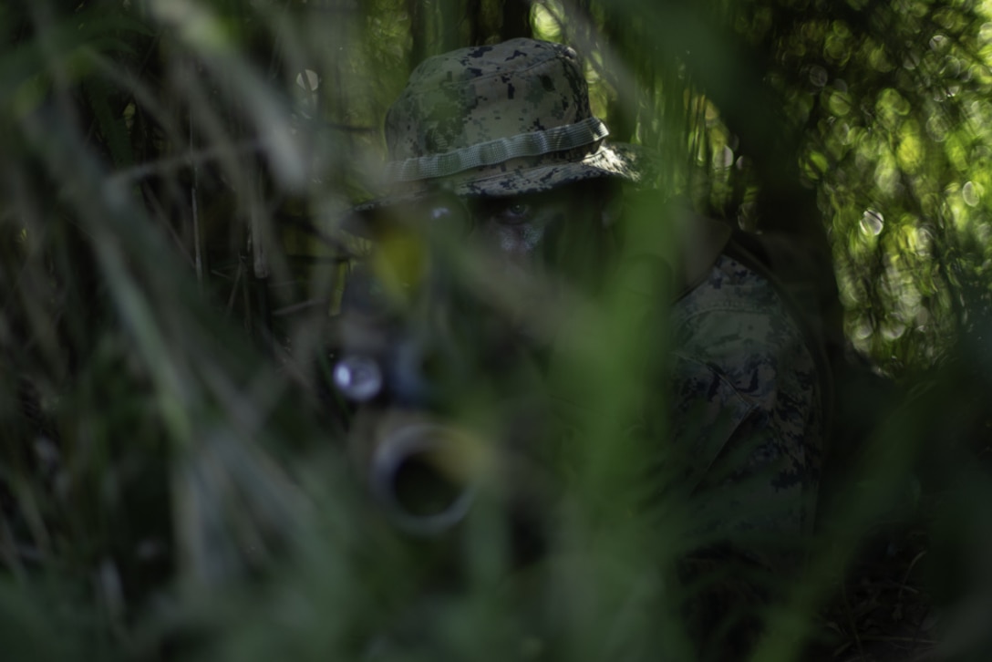 U.S. Marine Corps Cpl. Tyler Rautheaux, a mortarman with 2nd Battalion, 2nd Marines, provides security during urban operations within the Central Training Area on Okinawa, Japan, April 7, 2021. This dynamic training provided small unit leaders with the opportunity to improve their tactical decision making skills in offensive and defensive operations. 2/2 is forward-deployed in the Indo-Pacific under 4th Marines, 3rd Marine Division as a part of the Unit Deployment Program. Rautheaux is a native of Port Huron, Michigan.
