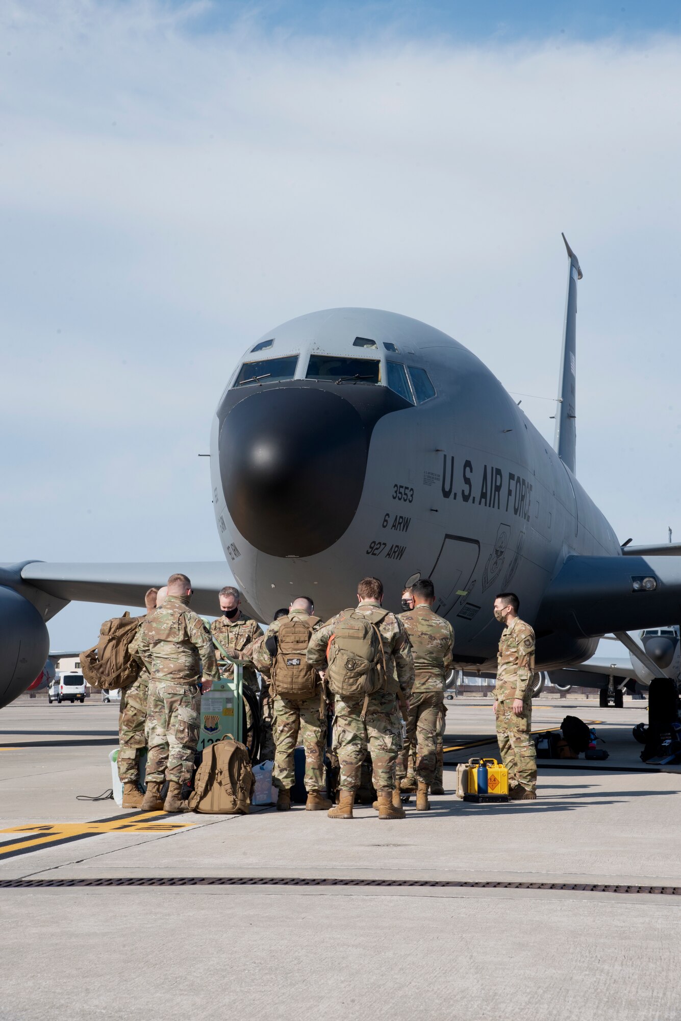 Team MacDill Airmen gather outside a KC-135 Stratotanker aircraft on the flight line, April 8, 2021 at MacDill Air Force Base, Fla.