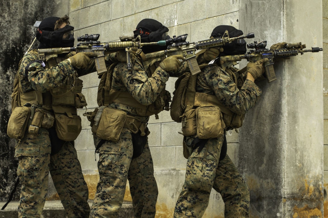 U.S. Marines with 2nd Battalion, 2nd Marines conduct urban operations within the Central Training Area on Okinawa, Japan, April 8, 2021. This dynamic training provided small unit leaders with the opportunity to improve their tactical decision making skills in offensive and defensive operations. 2/2 is forward-deployed in the Indo-Pacific under 4th Marines, 3rd Marine Division as a part of the Unit Deployment Program.