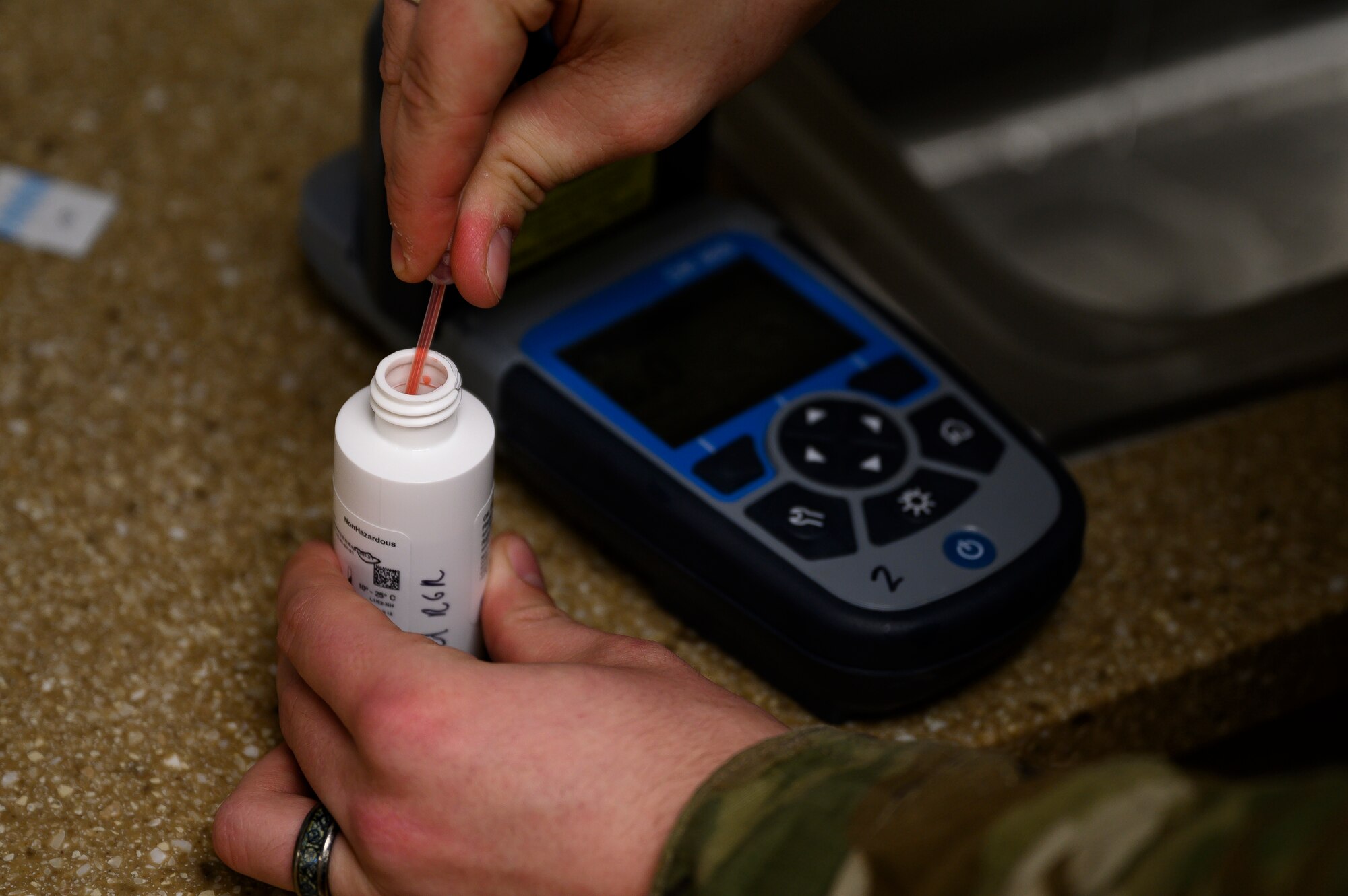 Airman 1st Class Brendan Saad, 341st Operational Medical Readiness Squadron bioenvironmental engineer apprentice, prepares a water sampling test April 5, 2021, at Malmstrom Air Force Base, Mont.