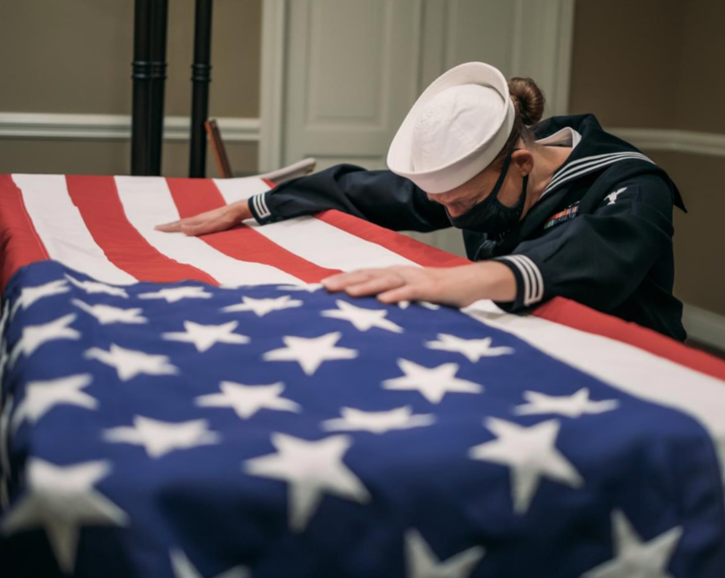 Personnel Specialist 1st Class Kitara Byerly attends her husband's funeral in Georgetown, Texas, 22 Nov., 2020.