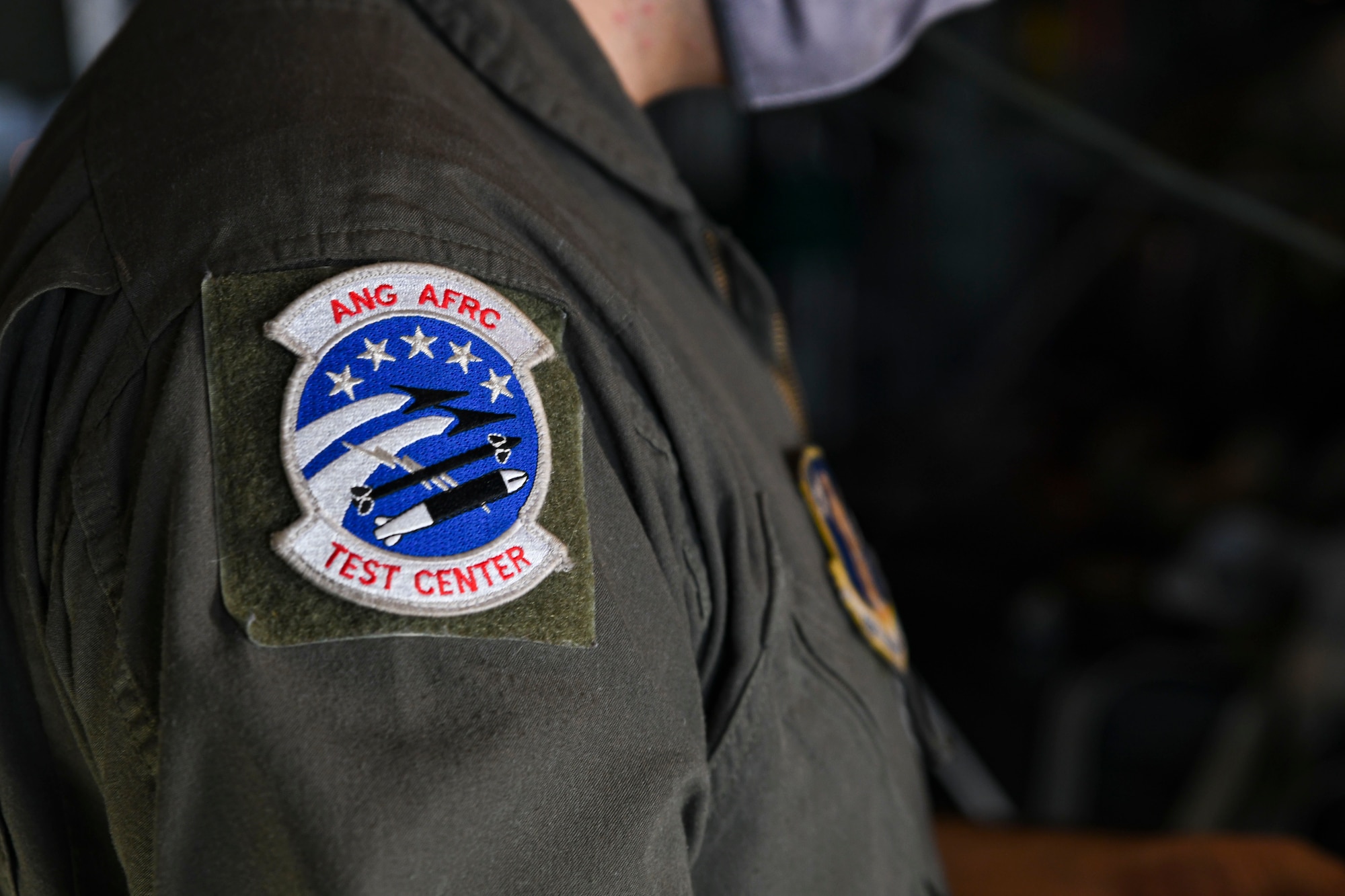 A photo of a patch on an airman's soldier.