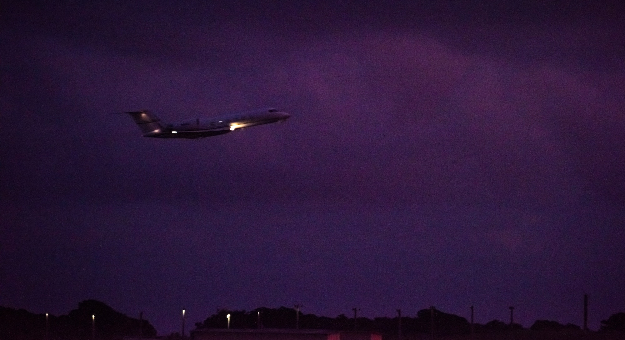 A Gulfstream IV departs AAFB