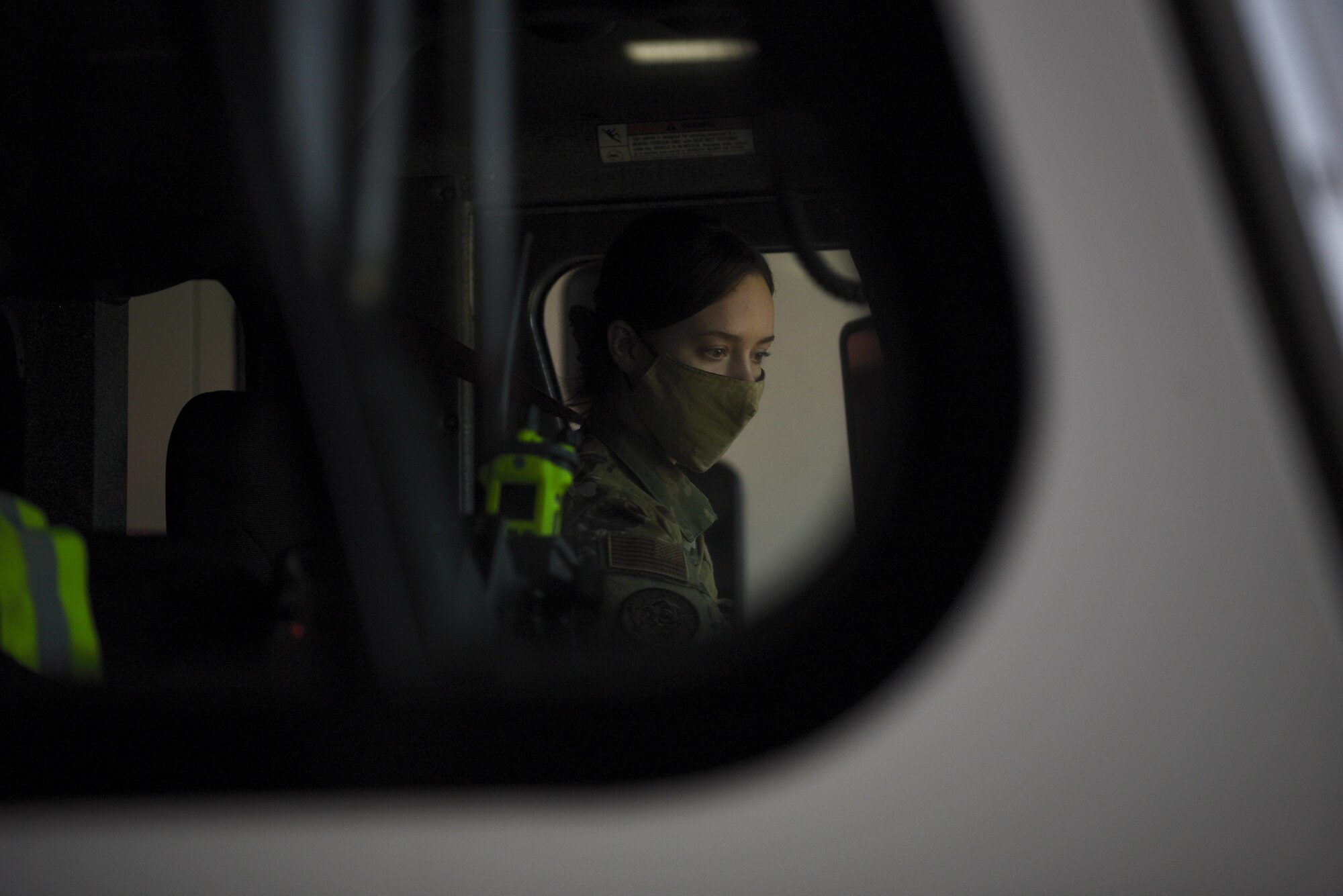 U.S. Air Force Staff Sgt. Journey Collier, a 35th Civil Engineer Squadron firefighter, backs a firetruck into a garage at Misawa Air Base, Japan, March 31, 2021. Collier recently won the Air Force Military Firefighter of the Year award and believes her accomplishments are a reflection of everybody else within her department. (U.S. Air Force photo by Airman 1st Class Joao Marcus Costa)