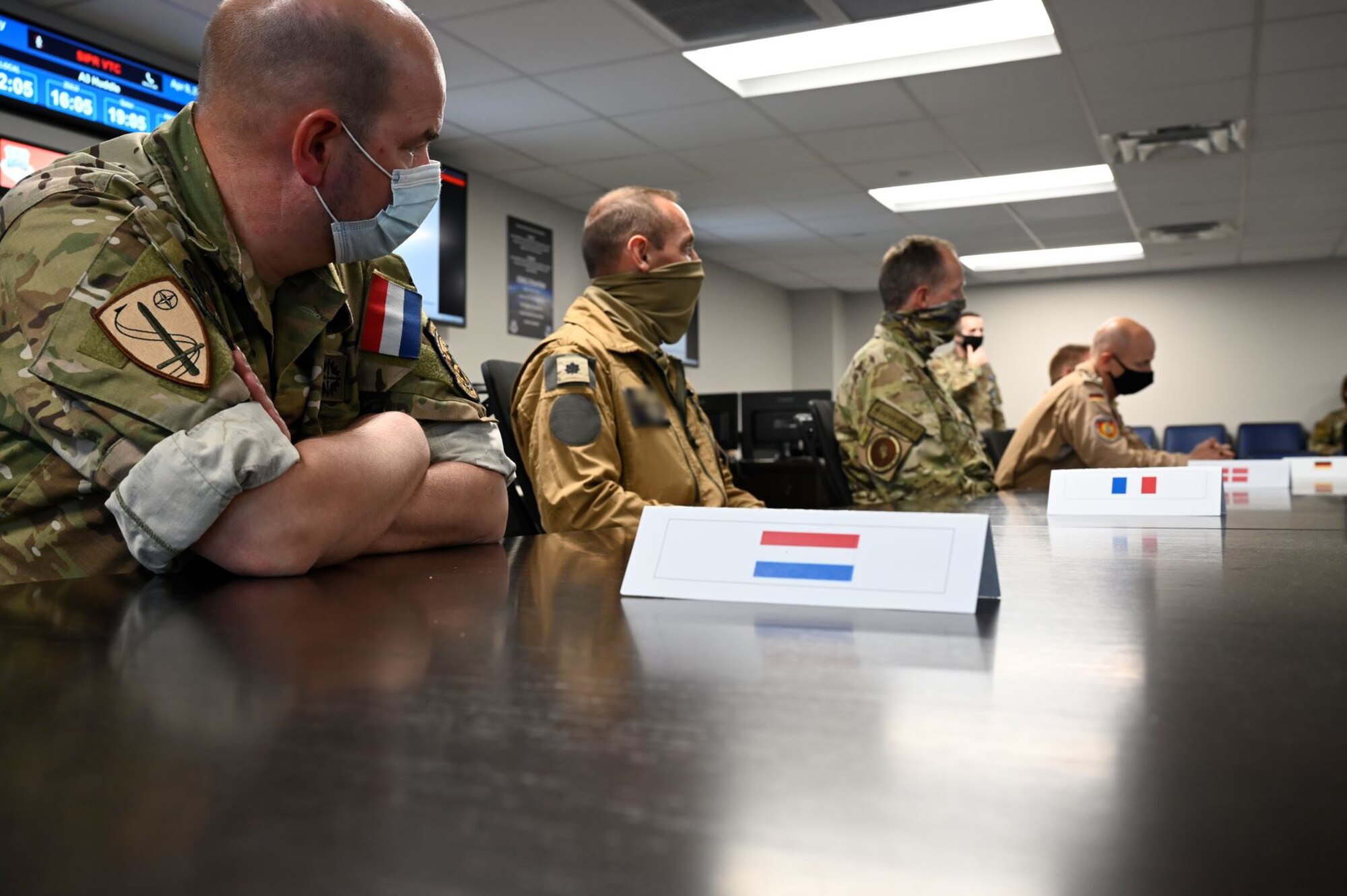 Coalition leaders from multiple countries gather for a conference at Shaw Air Force Base, South Carolina, April 9, 2021. Senior military representatives from nine countries traveled to Shaw AFB this week to participate in “Coalition Week,” a series of events focused on showcasing 9th Air Force’s (U.S. Air Forces Central) ability to distribute operations and command and control airpower from more than one location. (U.S. Air Force photo by Tech. Sgt. E’Lysia Wray/Released)