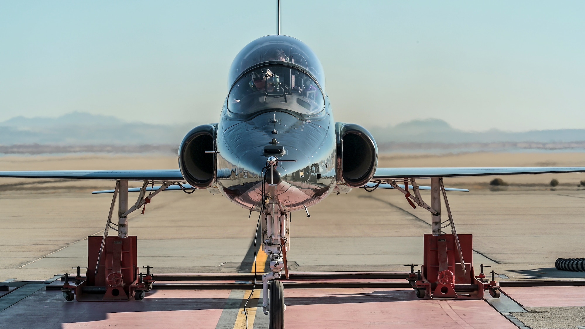 U.S. Air Force Test Pilot School student Capt. Mattia Nucciarelli, from the Italian Air Force, prepares to conduct a data collection test run at the Installed Engine Test Facility Horizontal Thrust Stand at Edwards Air Force Base, California, March 5. The thrust stand was installed in 1955 and has hosted dozens of different airframes throughout the years. (Air Force photo by Giancarlo Casem)