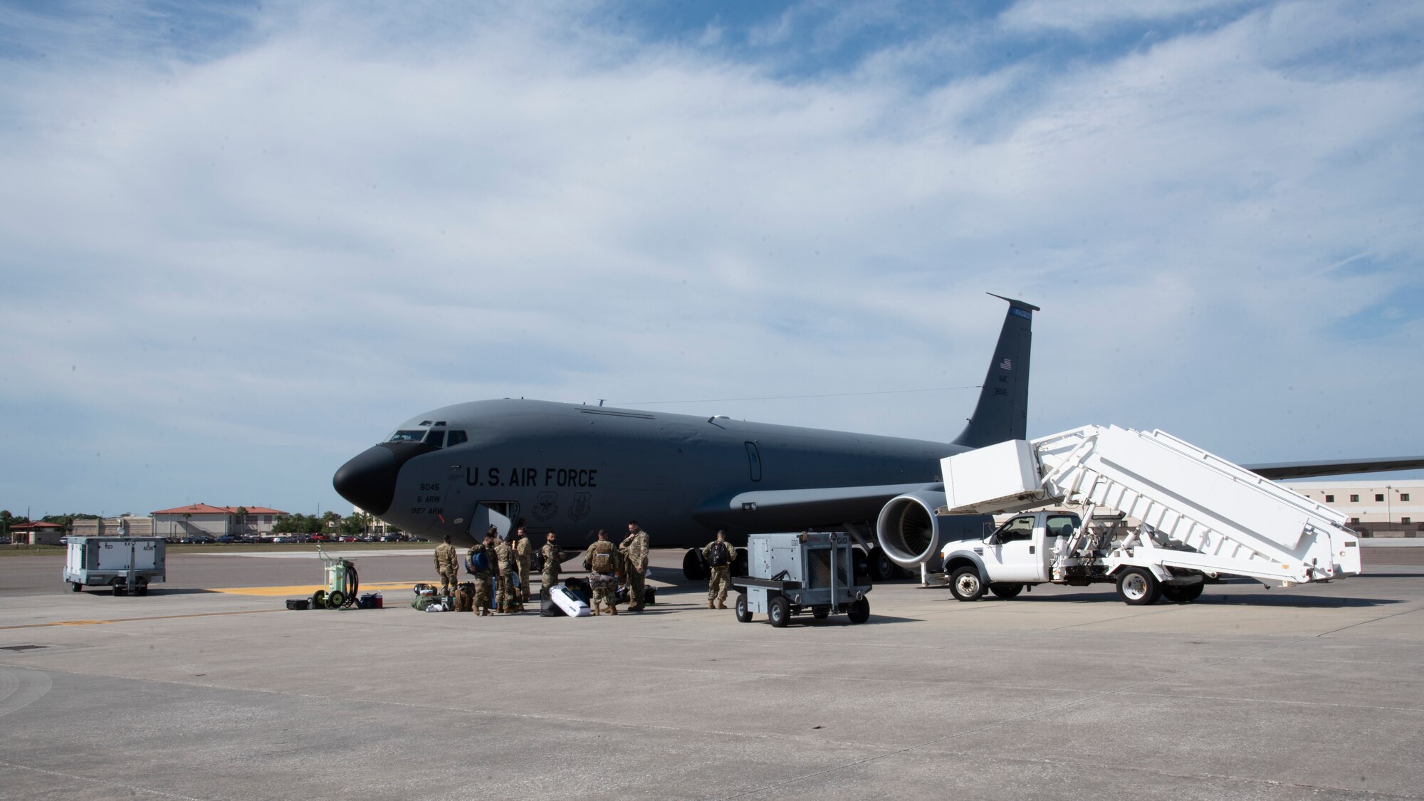 Team MacDill Airmen stand outside a KC-135 Stratotanker aircraft on the flight line, April 8, 2021 at MacDill Air Force Base, Fla.