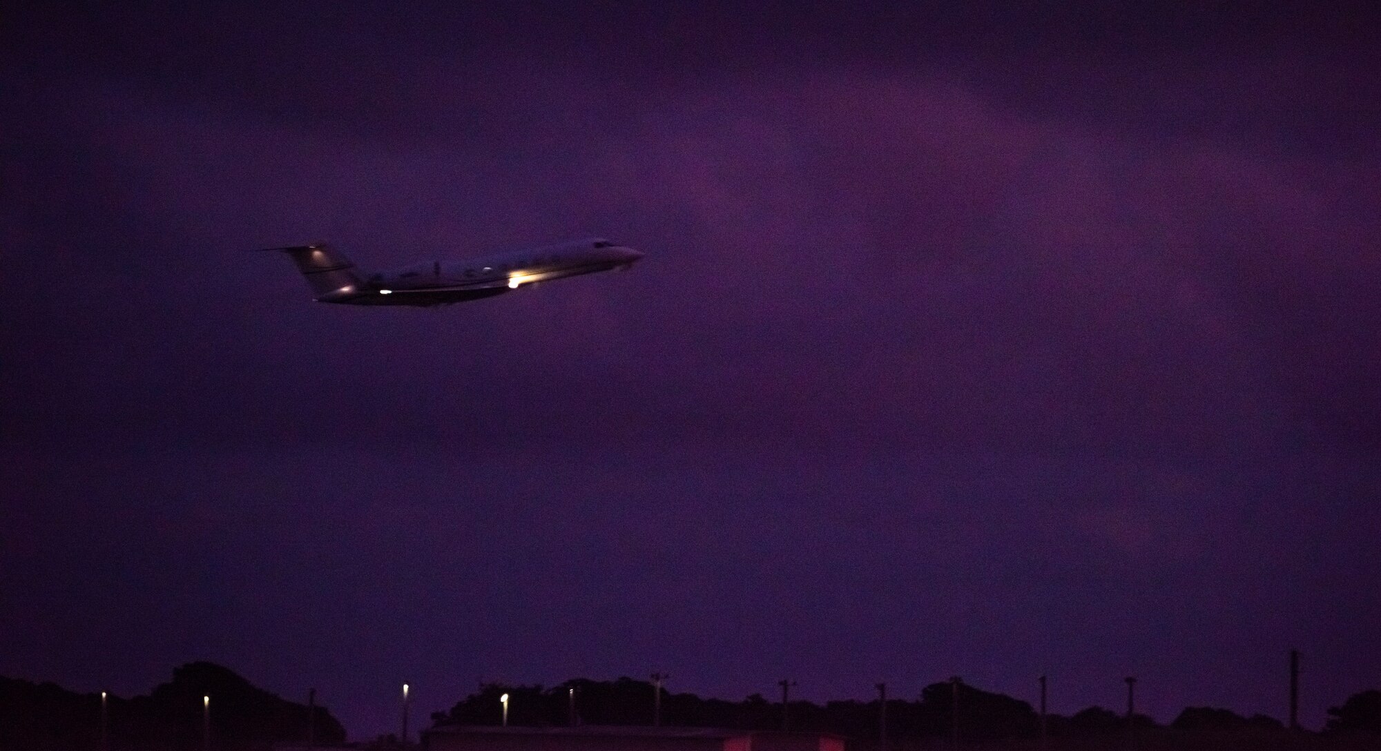 A Gulfstream IV departs AAFB