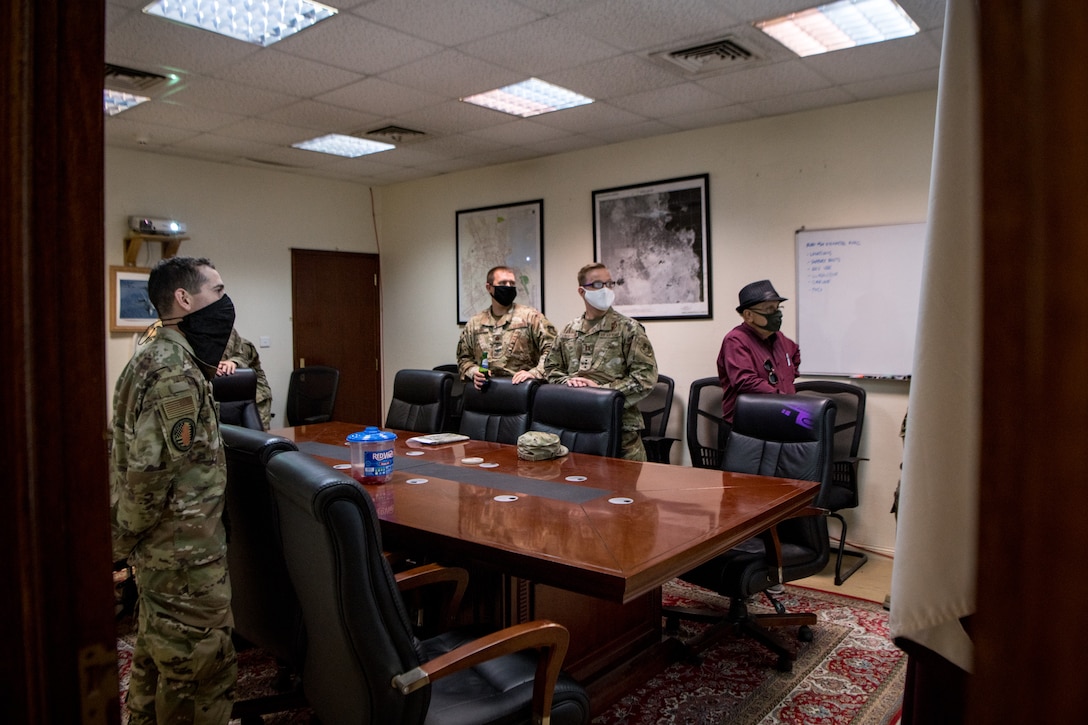 a group of airmen attend a meeting