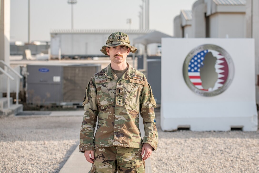 a man poses for a portrait