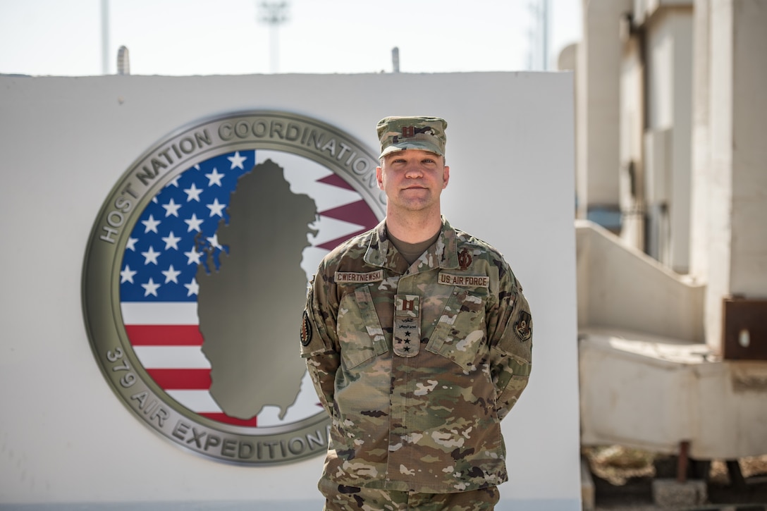 an airman poses for a portrait