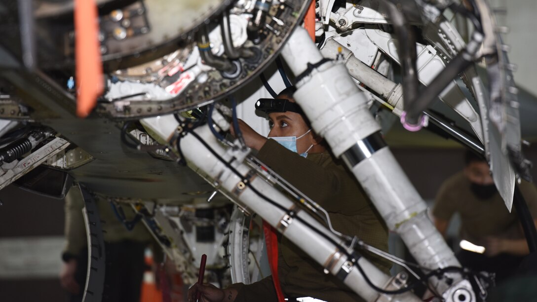 U.S. Air Force Staff Sgt. Kayla Bradford, 52nd Maintenance Squadron Aircraft Inspection Craftsman, conducts an aircraft phase inspection on a U.S. Air Force F-16 Fighting Falcon. The 52nd Maintenance Squadron Maintenance Flight won the 52nd Fighter Wing Flight Safety Award for the fourth quarter of 2020 and also for the first quarter of 2021. (U.S. Air Force photo by Tech. Sgt. Tony Plyler)