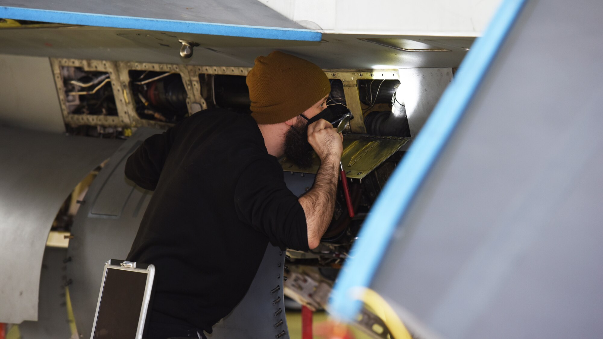 Mr. Joshua Larkin, 52nd Maintenance Squadron Aircraft Inspector, conducts an aircraft phase inspection on a U.S. Air Force F-16 Fighting Falcon. Larkin is one of two civilians employed by the 52nd Maintenance Squadron Maintenance Flight. (U.S. Air Force photo by Tech. Sgt. Tony Plyler)
