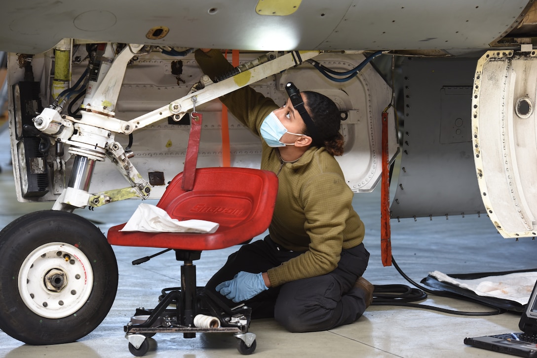 U.S. Air Force Staff Sgt. Kayla Bradford, 52nd Maintenance Squadron Aircraft Inspection Craftsman, conducts an aircraft phase inspection on a U.S. Air Force F-16 Fighting Falcon. The phase inspection is due every 400 flight hours. (U.S. Air Force photo by Tech. Sgt. Tony Plyler)