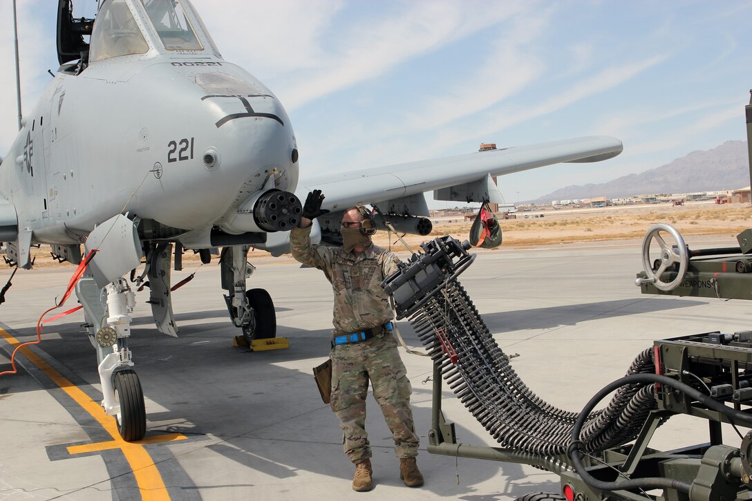 Tech. Sgt. Jay Weir, 127th Wing, prepares to load 30mm bullets on to an A-10 Thunderbolt II at Nellis Air Force Base, Nev., April 9, 2021.