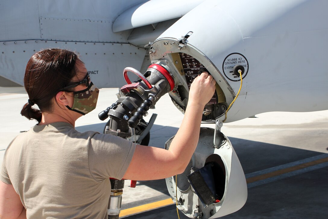 Tech. Sgt. Tami Morgan, a crew chief with the Michigan Air National Guard’s 127th Maintenance Group, 127th Wing, prepares to refuel an A-10 Thunderbolt II aircraft at Nellis Air Force Base, Nevada, April 12, 2021.