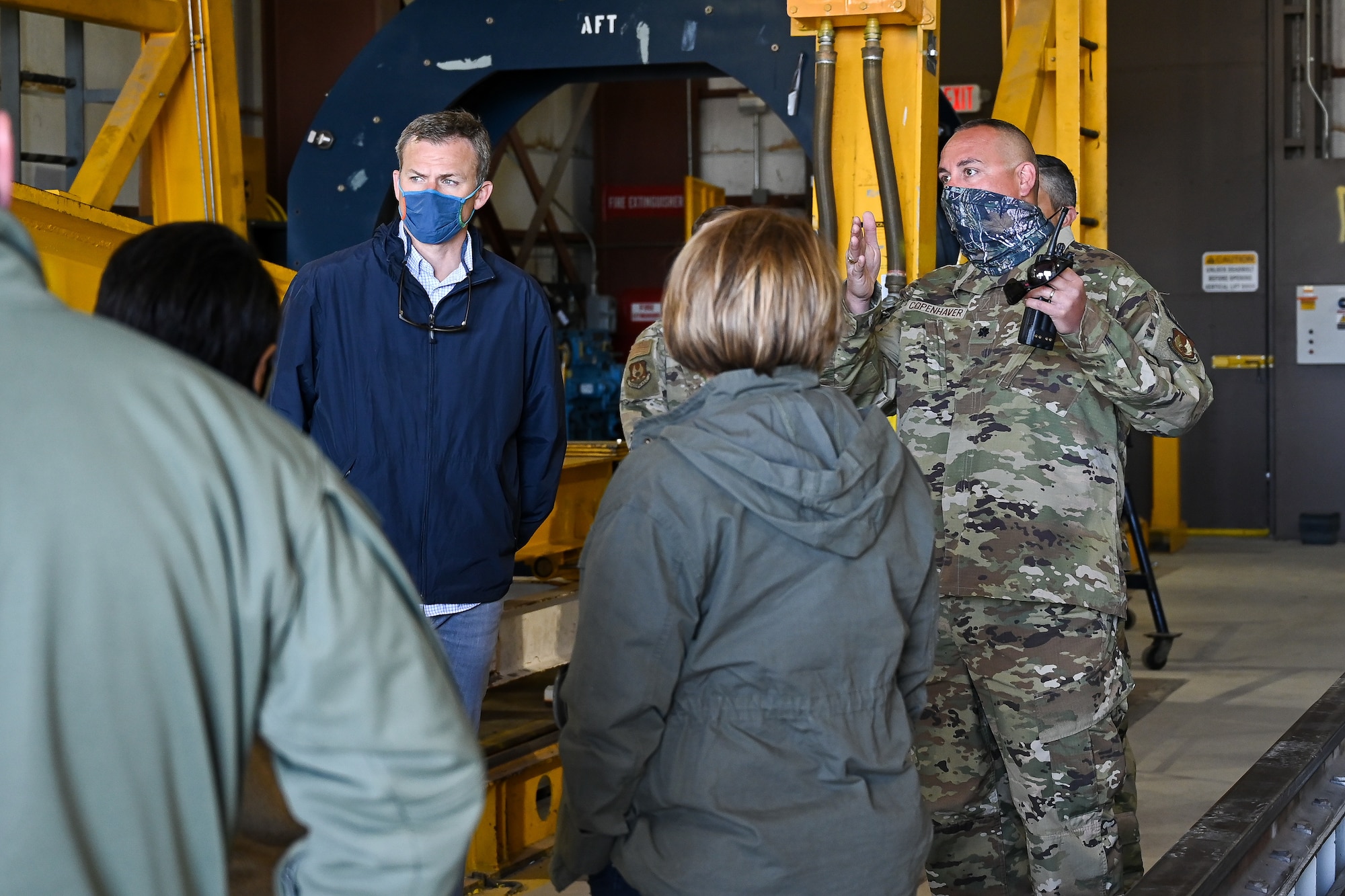 U.S. Rep. Blake Moore (UT-1) and other standing in a missile transfer facility.