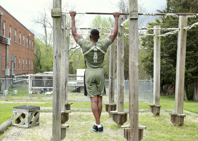 Capt. Donovan Holloway, an intelligence officer at Marine Corps Systems Command, demonstrates a prototype version of the new Physical Training Uniform. On April 13, MCSC awarded four contracts to manufacture prototypes for an updated PTU, which will then be tested and evaluated by MCSC. The uniform will provide a more athletic fit that aligns with today’s commercial clothing trends.