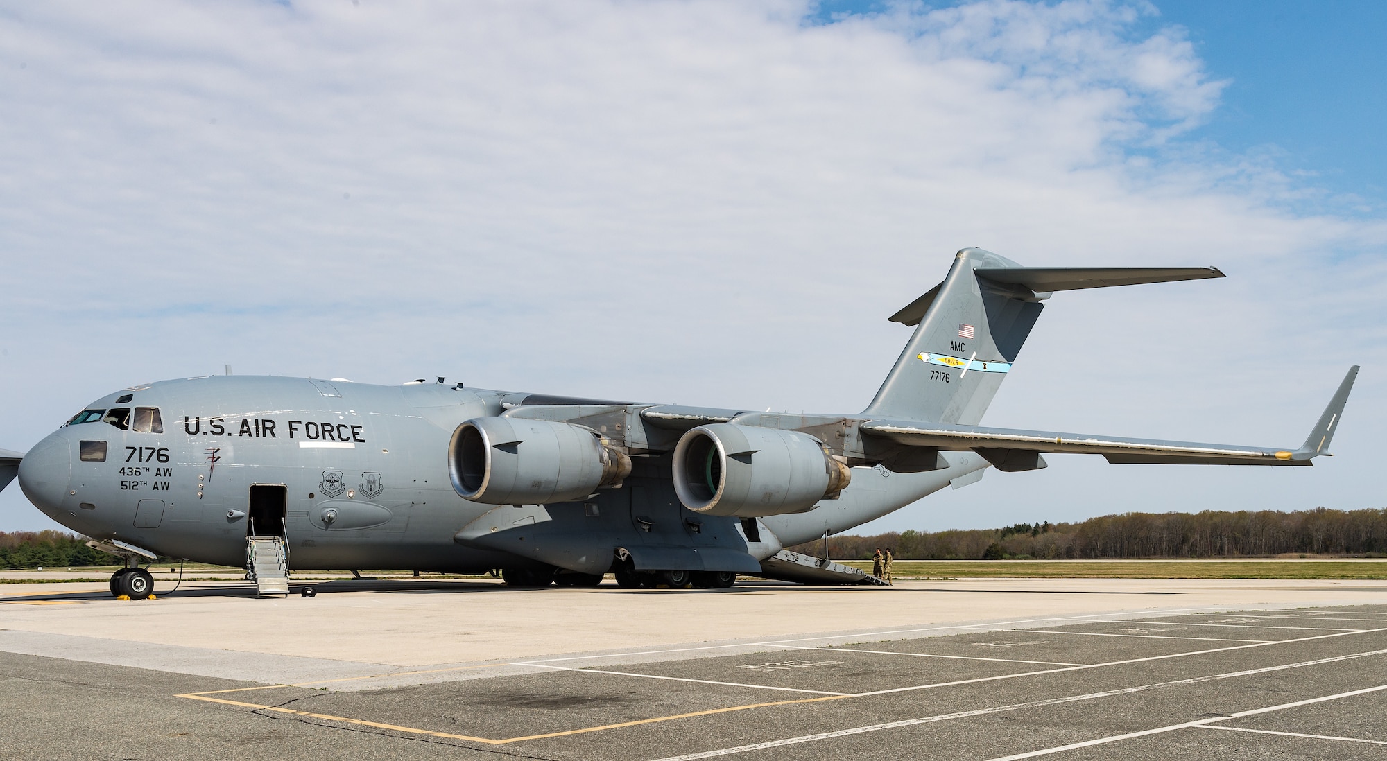A C-17 Globemaster III is prepared for maintenance on the flight line at Dover Air Force Base, Delaware, April 7, 2021. The inherent flexibility and performance of the C-17 force improve the ability of the total airlift system to fulfill the worldwide air mobility requirements of the United States. Thirteen C-17s are assigned to Dover AFB. (U.S. Air Force photo by Roland Balik)