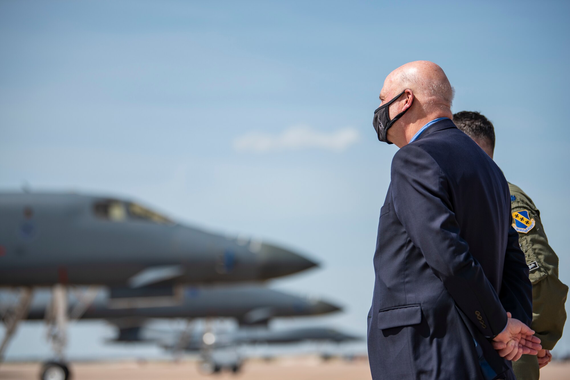 Acting Secretary of the Air Force John Roth observes a fleet of B-1B Lancer aircraft at Dyess Air Force Base, Texas, April 6, 2021. During the tour of Dyess AFB, Roth received briefings on the B-1s traditional combat capabilities, as well as the bombers more recent role in participating in strategic Bomber Task Force deployments. (U.S. Air Force photo by Airman 1st Class Colin Hollowell)