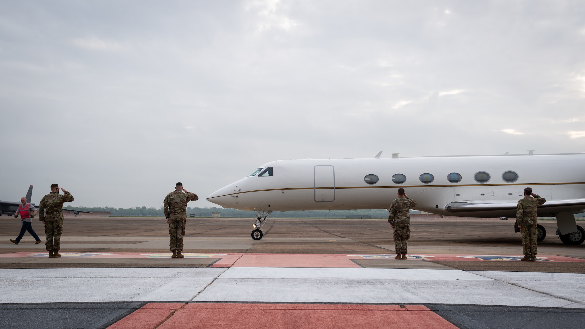 Leaders from the 2nd Bomb Wing and Air Force Global Strike Command salute the arrival of Honorable John P. Roth, acting Secretary of the Air Force, at Barksdale Air Force Base, Louisiana, April 6, 2021. Regardless of the uncertainties or changes the world brings, the 2nd BW is a loyal defender of the national security objectives. (U.S. Air Force photo by Senior Airman Max Miller)