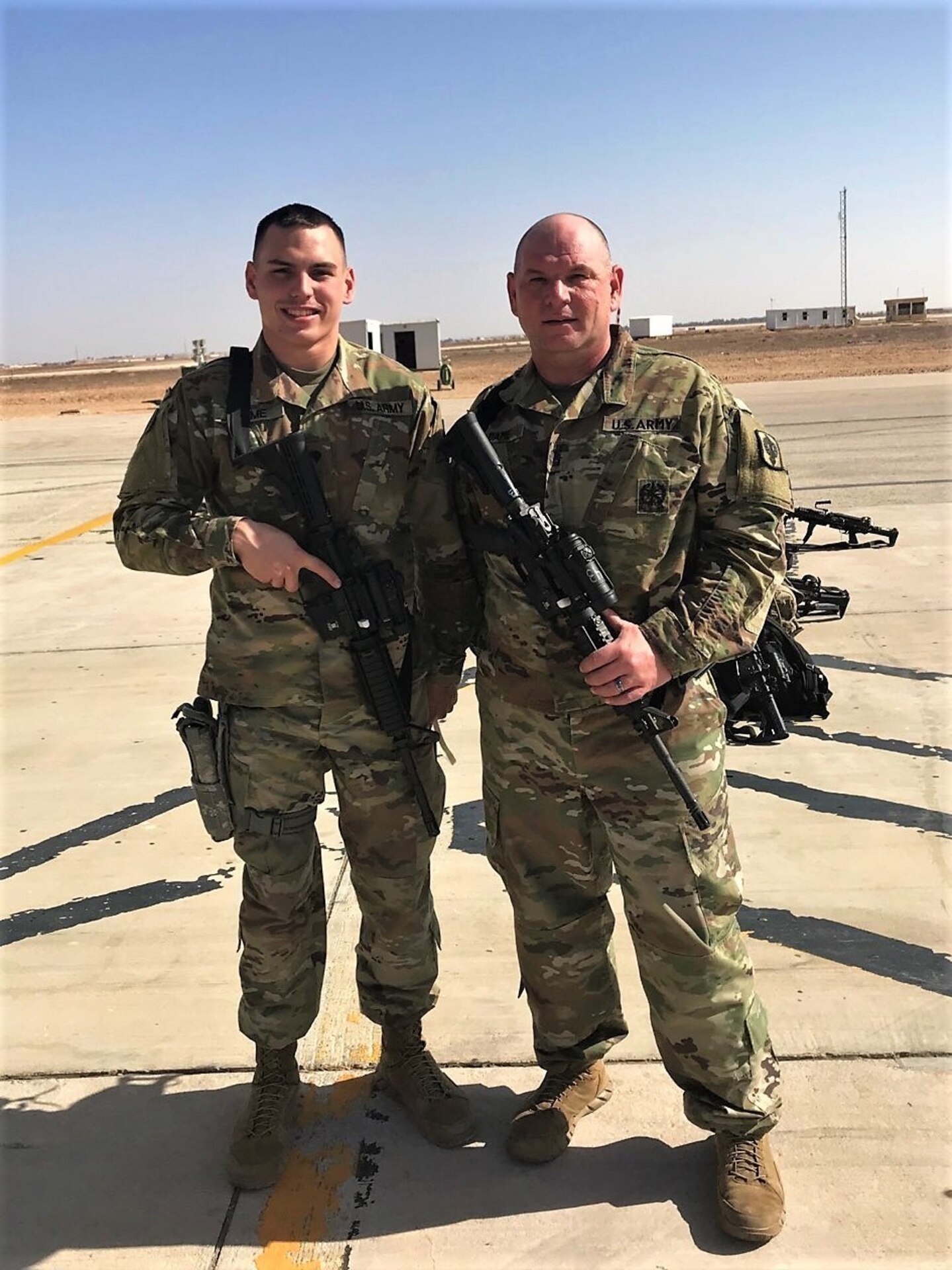 Sgt. 1st Class Christopher Dame arrives in theater with his son Spc. Christopher Dame assigned to the 13th Field Artillery Brigade