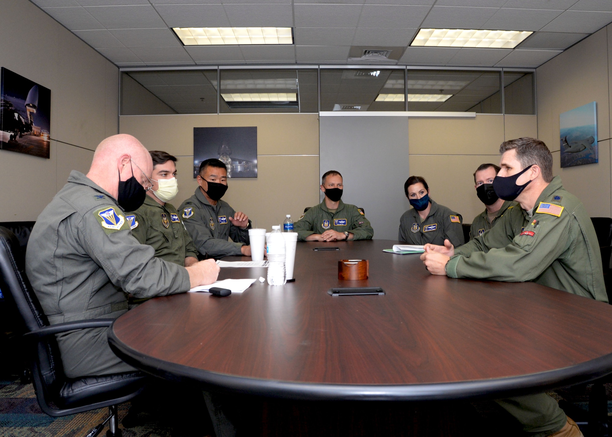 Sitting far right, Lt. Col. Seth Asay, 733rd Training Squadron commander, speaks with 4th Air Force A3 team members during their visit to the 433rd Airlift Wing, April 9, 2021, at Joint Base San Antonio-Lackland, Texas. The team learned about potential deficiencies in training with the goal to assist facilitation of improvements to 4th AF leadership. (U.S. Air Force photo by Tech. Sgt. Samantha Mathison)