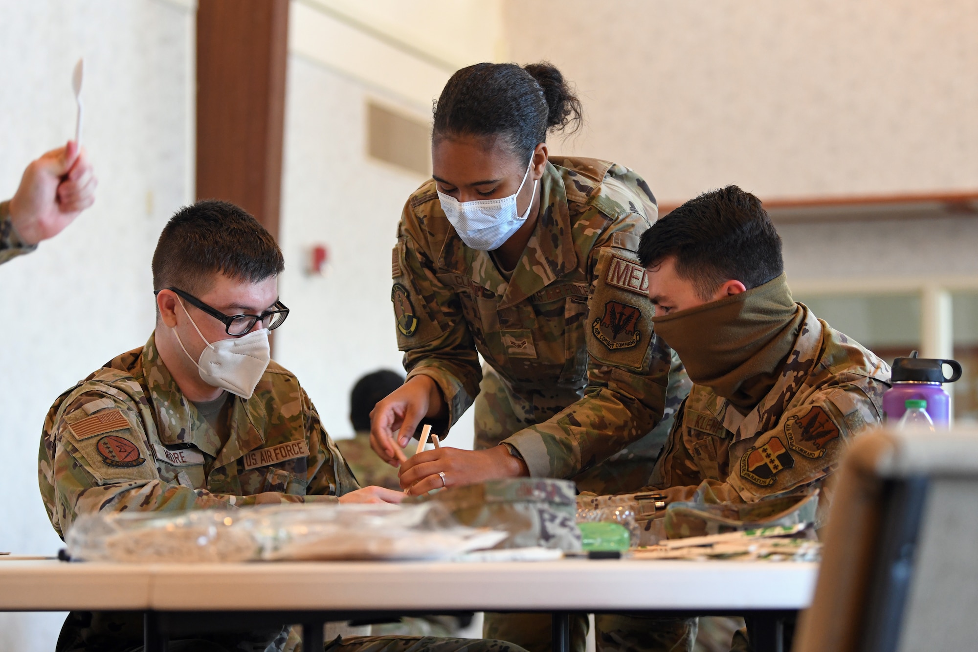 Airmen attending the Spiritual ISR(Intelligence Surveillance and Reconnaissance) Program build a catapult during a teamwork-building exercise, March 29, 2021, at Beale Air Force Base California. The Spiritual ISR Program was organized by the Recce Town Chaplain Team and gives junior airmen the tools to help guide members in need in the right direction. (U.S. Air Force photo by Airman 1st Class Luis A. Ruiz-Vazquez)