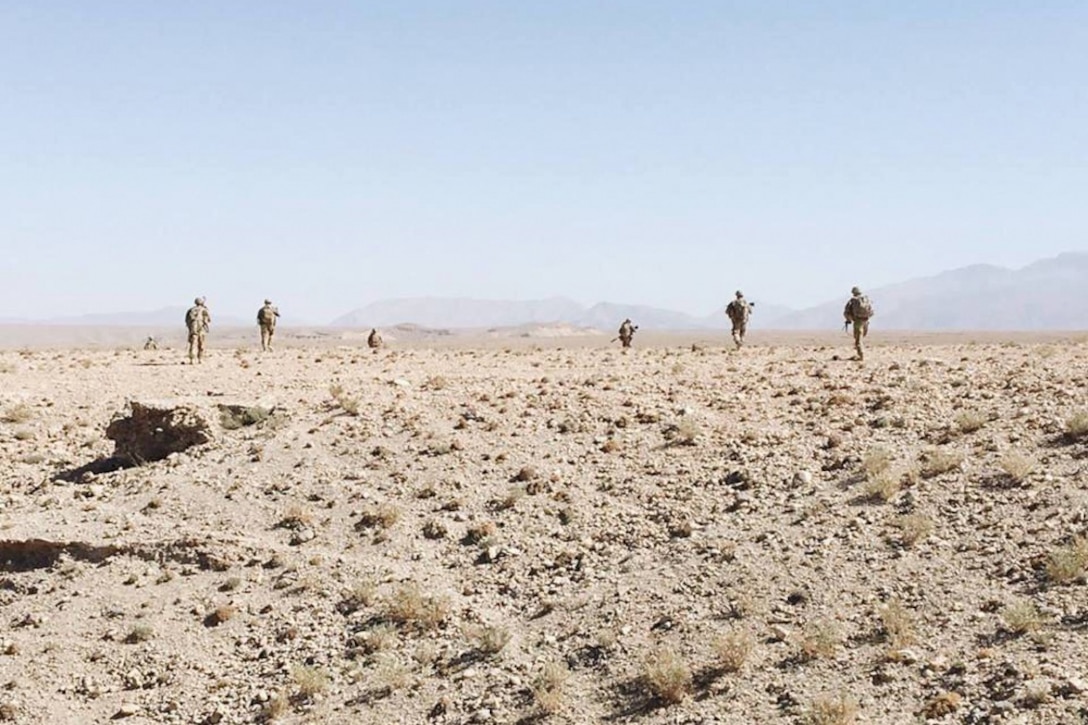 Soldiers patrol in Afghanistan.