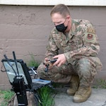 U.S. Air Force Senior Airman Shayne Mooney, an explosive ordinance disposal technician with the 902nd Civil Engineering Squadron at Joint Base San Antonio-Lackland, operates the Man Transportable Robotic Systems-Increment II, or MTSR II, during training at Joint Base San Antonio-Lackland April 14.