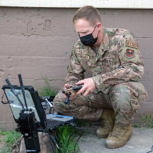 U.S. Air Force Senior Airman Shayne Mooney, an explosive ordinance disposal technician with the 902nd Civil Engineering Squadron at Joint Base San Antonio-Lackland, operates the Man Transportable Robotic Systems-Increment II, or MTSR II, during training at Joint Base San Antonio-Lackland April 14.