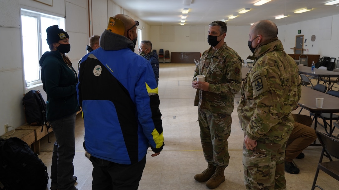 Maj. Gen. Torrence Saxe, commissioner for the Department of Military and Veterans Affairs and adjutant general of the Alaska National Guard, speaks with Chevak community members prior to a townhall meeting held at the Chevak City Office in Chevak, Alaska, April 9, 2021. Members of the Alaska Department of Military and Veterans Affairs, the Department of Environmental Conservation, and the Department of Commerce, Community, and Economic Development traveled to Western Alaska April 7-9 to meet with Tribal leaders and citizens in Bethel, Tuluksak, and Chevak to discuss disaster assistance measures and processes in light of recent emergencies that have occurred in the region, and in preparation for the upcoming flood season. (U.S. Army National Guard photo by Dana Rosso)