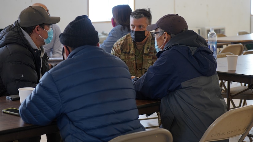 Maj. Gen. Torrence Saxe, commissioner for the Department of Military and Veterans Affairs and adjutant general of the Alaska National Guard, speaks with Chevak community members prior to a townhall meeting held at the Chevak City Office in Chevak, Alaska, April 9, 2021. Members of the Alaska Department of Military and Veterans Affairs, the Department of Environmental Conservation, and the Department of Commerce, Community, and Economic Development traveled to Western Alaska April 7-9 to meet with Tribal leaders and citizens in Bethel, Tuluksak, and Chevak to discuss disaster assistance measures and processes in light of recent emergencies that have occurred in the region, and in preparation for the upcoming flood season. (U.S. Army National Guard photo by Dana Rosso)