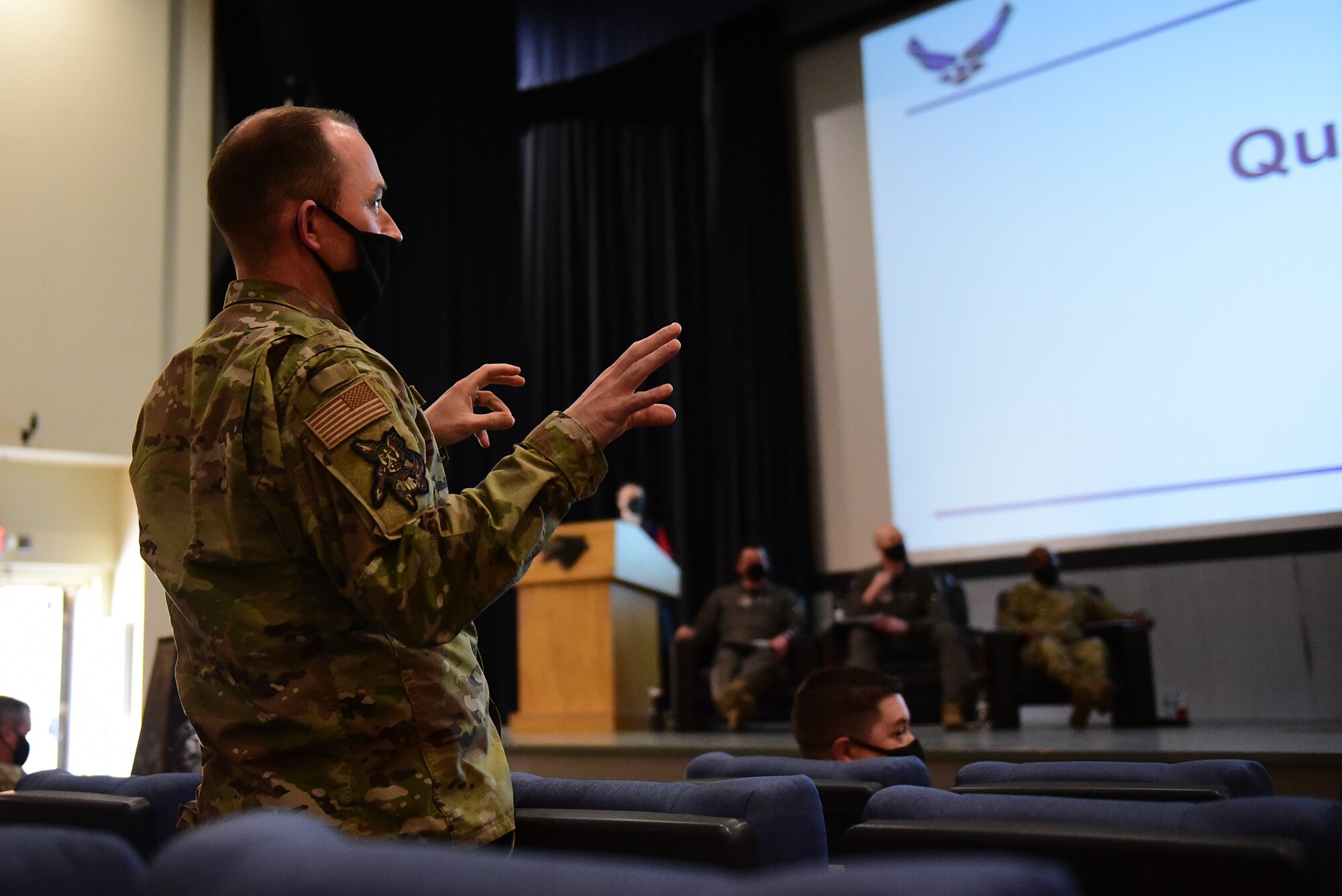 Senior Master Sgt. John Williams, 80th Aircraft Maintenance Unit assistant superintendent, asks a question after a Wolf Tank presentation at Kunsan Air Base, Republic of Korea, April 9, 2021. Wing leadership funded three of the five ideas that were presented, which included a wireless intercom system, an inner ear bone conducting headset, and hardened aircraft system GPS repeaters.  (U.S. Air Force photo by Senior Airman Suzie Plotnikov)