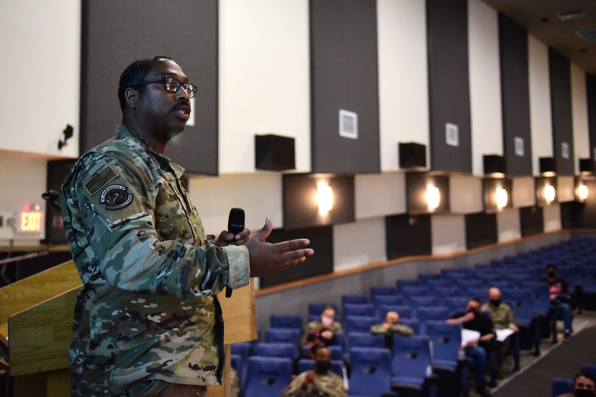 Tech. Sgt. Byron Cole, 8th Maintenance Squadron inspections section chief, briefs about an inner ear bone conducting headset during a Wolf Tank at Kunsan Air Base, Republic of Korea, April 9, 2021. Wing leadership funded three of the five ideas that were presented, which included a wireless intercom system, an inner ear bone conducting headset, and hardened aircraft system GPS repeaters. (U.S. Air Force photo by Senior Airman Suzie Plotnikov)