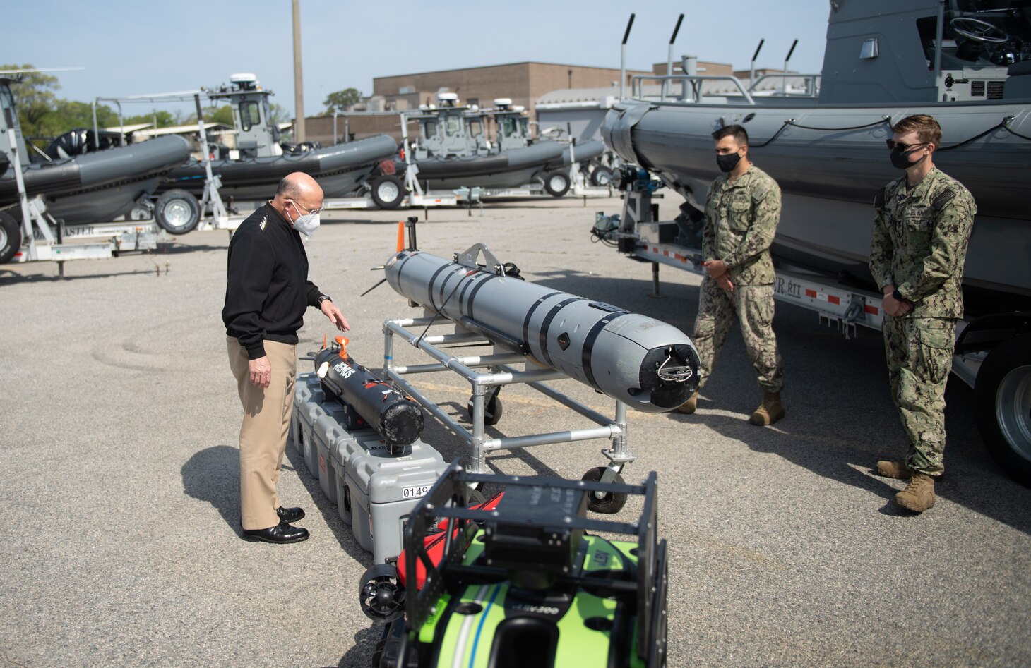 VIRGINIA BEACH, Va. (April 14, 2020) – Chief of Naval Operations Mike Gilday views a MK 18 MOD 2 unmanned undersea vehicle during a tour of Explosive Ordnance Disposal Group (EODGRU) Two STRIKE facility onboard Joint Expeditionary Base Little Creek, April 14, 2021. Gilday and Master Chief Petty Officer of the Navy Russel Smith toured the EODGRU 2 STRIKE facility and met with EOD operators and Navy divers to discuss capabilities and equipment employed by the force. EOD STRIKE protects individuals and teams in the EOD Force from debilitating stress through adaptability, recovery and growth across the personal, social, cognitive and physical wellness domains. (U.S. Navy photo by Mass Communication Specialist Seaman Apprentice Nicholas Skyles)