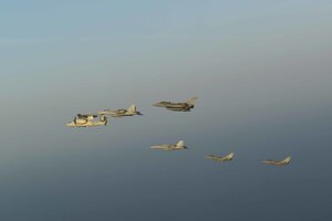 210413-N-NO712-1238 ARABIAN SEA (April 13, 2021) - U.S. Navy F/A-18F and F/A-18E Super Hornet fighter jets, an E-2C Hawkeye tactical airborne early warning aircraft and French Marine Nationale Dassault Rafale fighter jets fly in formation during dual carrier operations between the aircraft carriers USS Dwight D. Eisenhower (CVN 69) and FS Charles de Gaulle (R 91) in the Arabian Sea, April 13. The Eisenhower Carrier Strike Group is deployed to the U.S. 5th Fleet area of operations in support of naval operations to ensure maritime stability and security in the Central Region, connecting the Mediterranean and Pacific through the western Indian Ocean and three strategic choke points. (U.S. Navy Photo)