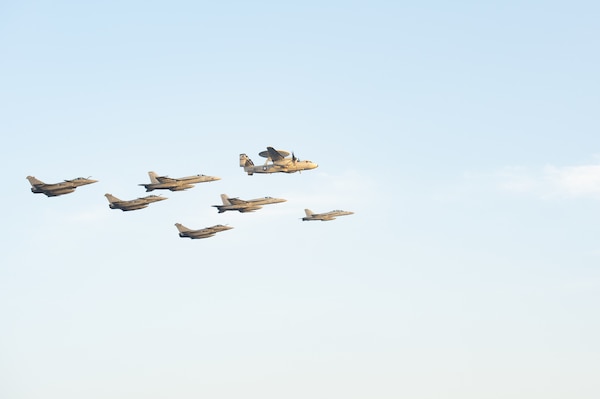 U.S. Navy and French navy aircraft fly in formation during dual carrier operations between USS Dwight D. Eisenhower (CVN 69) and FS Charles de Gaulle (R 91) in the Arabian Sea.