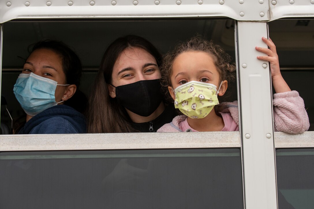 Children participating in the 4th Logistics Readiness Squadron Kids Day event are transported to different activities during the event at Seymour Johnson Air Force Base, North Carolina, March 24, 2021.