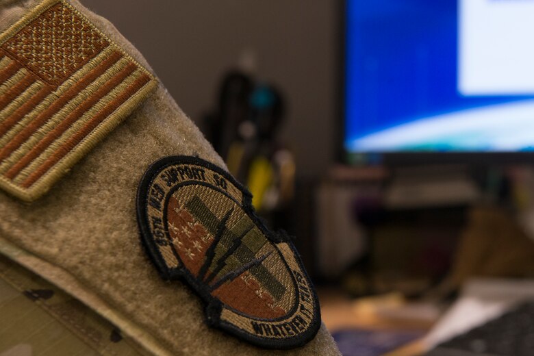 An 86th Medical Support Squadron patch sits on the uniform of U.S. Air Force Tech. Sgt. Kaci Stephens, 86th MDSS medical information services flight client support noncommissioned officer in charge, at Ramstein Air Base, Germany, April 6, 2021.