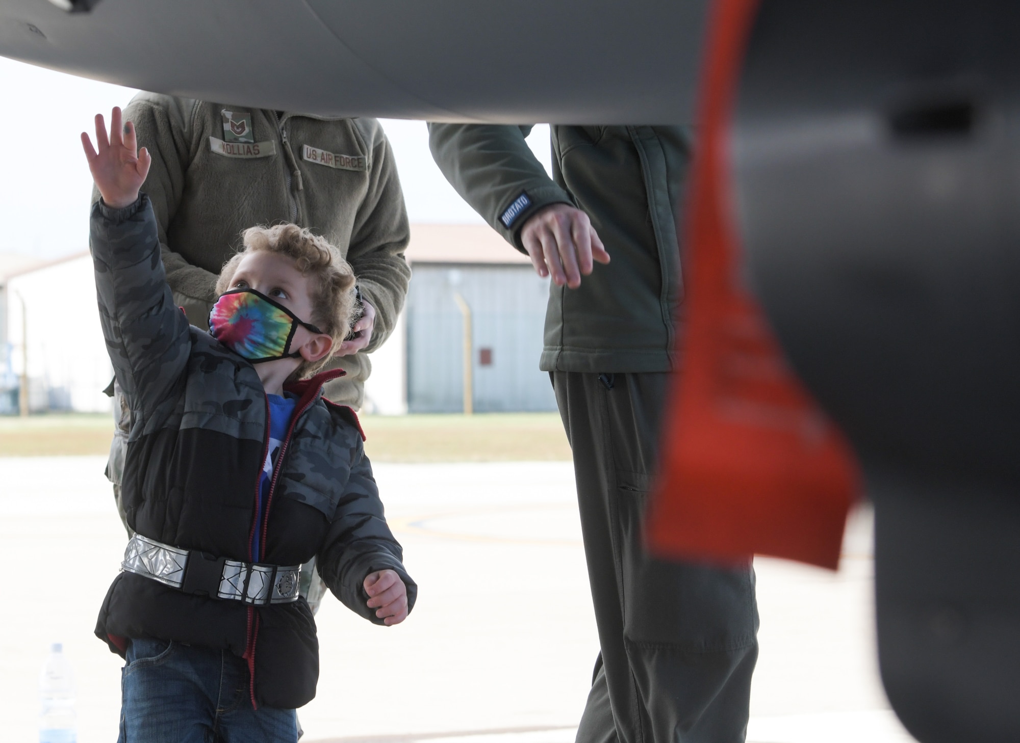 A military-affiliated child explores an F-15E Strike Eagle assigned to the 48th Fighter Wing during a tour on April 15, 2021, at Royal Air Force Lakenheath, England. The tour was part of the Month of the Military child initiative, which stresses the importance of providing children with quality services and support to help them succeed in the mobile military lifestyle. (U.S. Air Force photo by Senior Airman Shanice Ship)