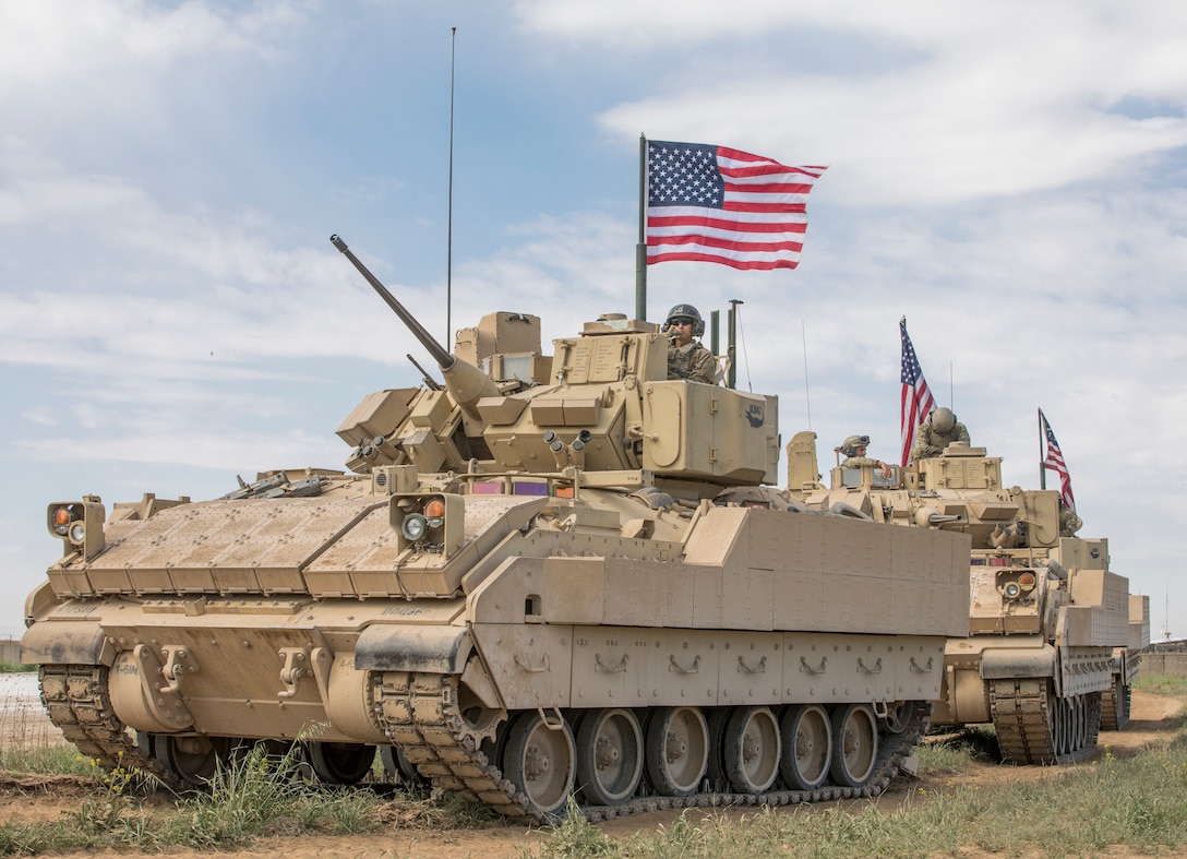 U.S. Army Soldiers, with Alpha Company, 1st Battalion, 6th Infantry Regiment, 2nd Armored Brigade Combat Team, 1st Armored Division, visits village elders to evaluate the local atmospheric conditions in the Central Command (CENTCOM) area of responsibility, Apr. 12, 2021. The Soldiers are supporting the Combined Joint Task Force-Operation Inherent Resolve (CJTF-OIR) mission. CJTF remains committed to working by, with, and through our partners to ensure the enduring defeat of Daesh. (U.S. Army photo by Sgt. Torrance Saunders)