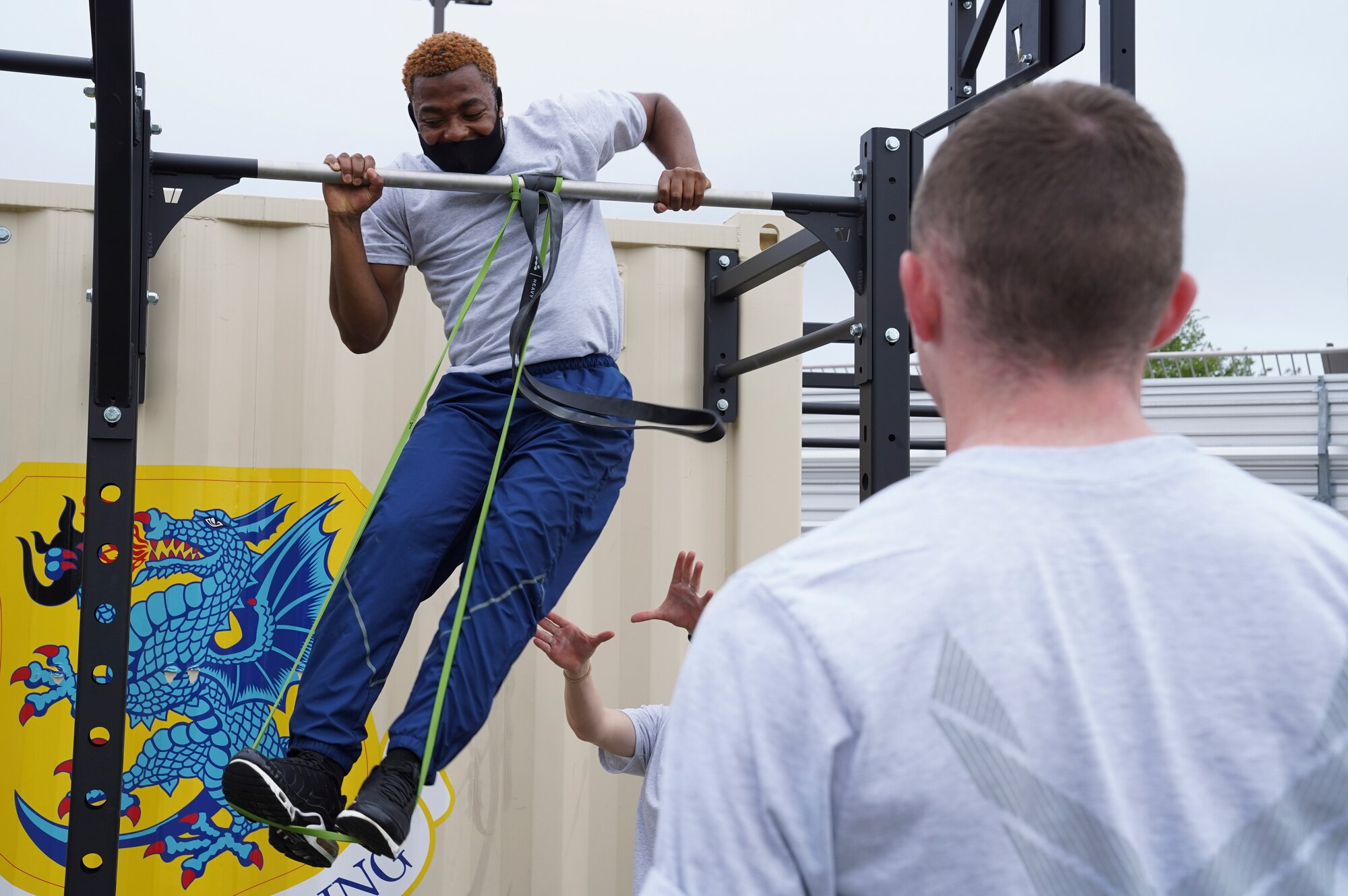 U.S. Air Force Airman Kisibo Kasha, 336th Training Squadron knowledge management student, attempts to do a pull up on a Beaver Fit Box at Keesler Air Force Base, Mississippi, April 10, 2021. The 81st Training Group acquired the Beaver Fit Boxes to provide more places for Airmen in training to work out while indoor gyms are operating at a limited capacity. (U.S. Air Force photo by Senior Airman Spencer Tobler)